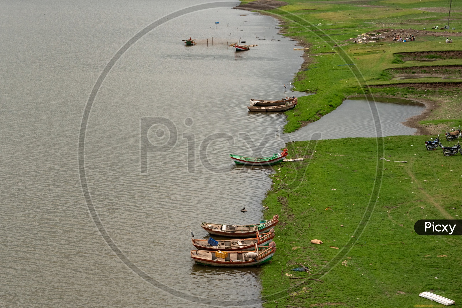 Boats parked at river banks near Bhigwan