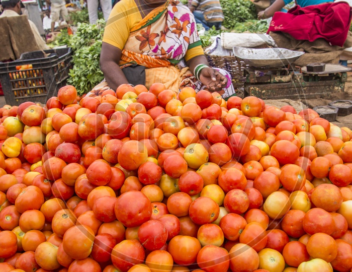 Female Vegetable Vendor at Gudimalkapur Flower Market