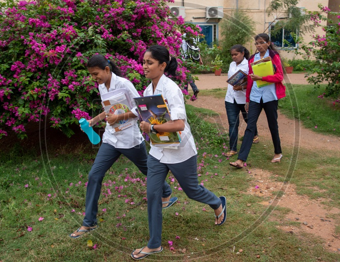 Girl Students rushing to their exam hall at an educational institute in Hyderabad