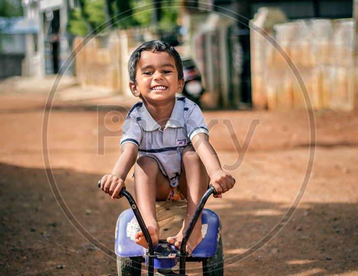Little Rider - child smiling