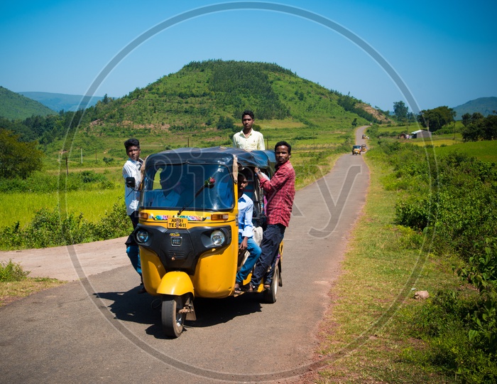 Auto Rickshaw with passengers