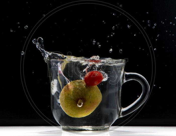 Fruits dropped into water