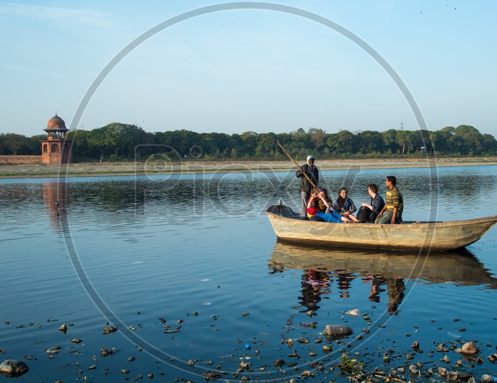 Tourists on boat ride on Yamuna River