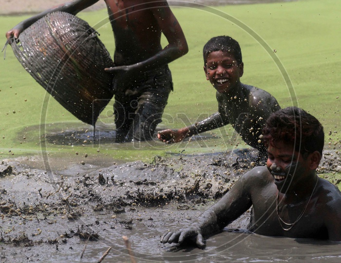 Kids in a dried pond