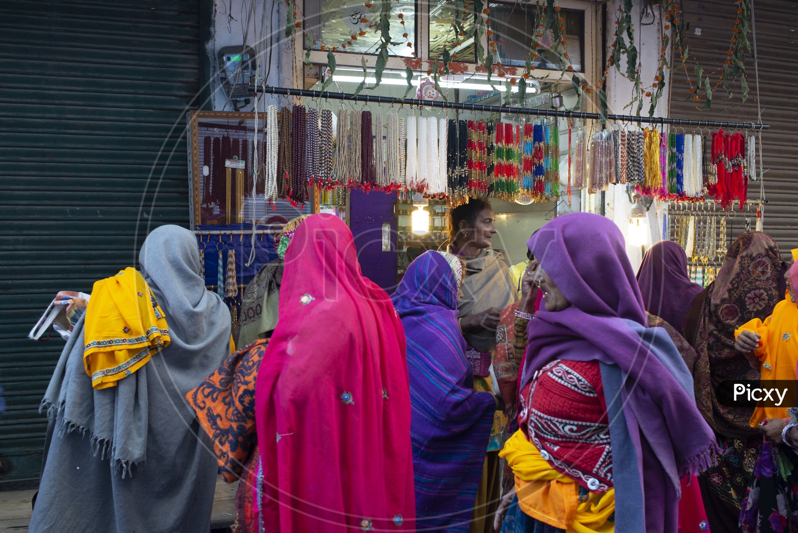 Rajasthani Ladies Shopping at Shop during Pushkar Fair, Rajasthan