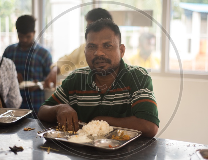 people having food in anna canteen