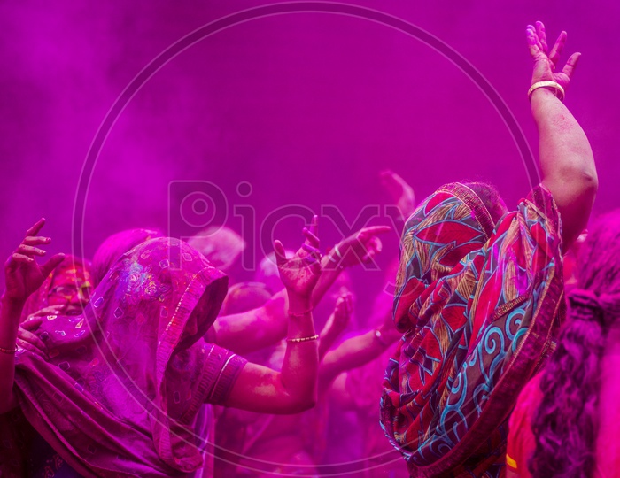 People Celebrating Holi Festival in Begum Bazaar