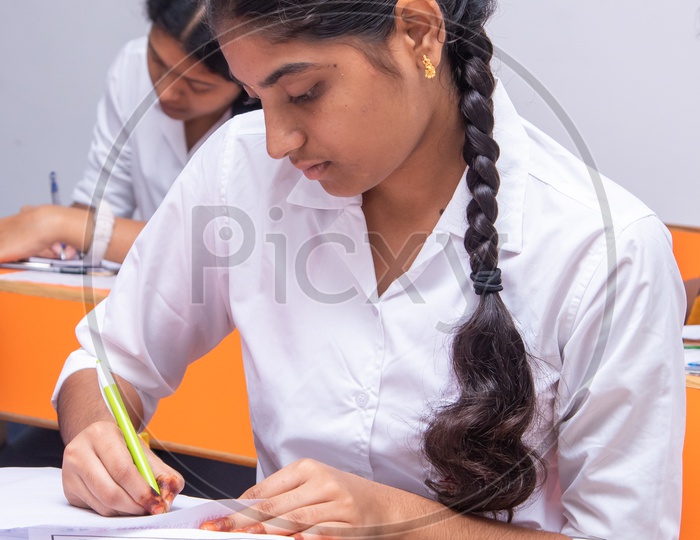 Student writing an exam at an educational institution