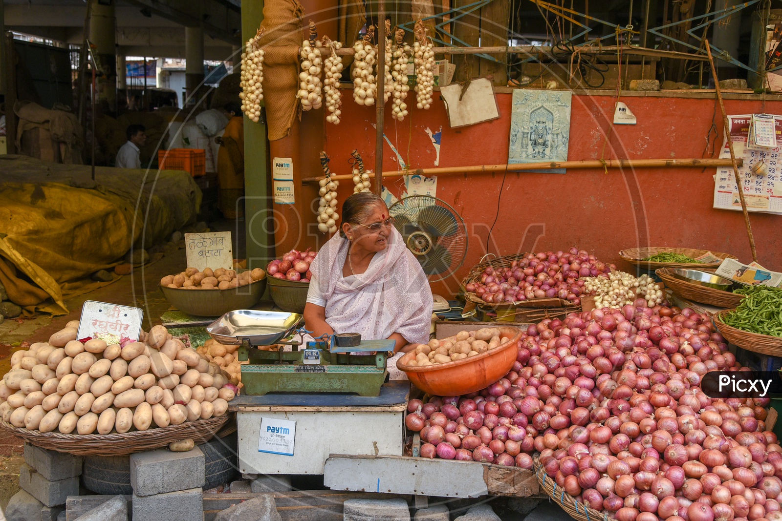Woman Vegetable Vendor in a Market in Pune