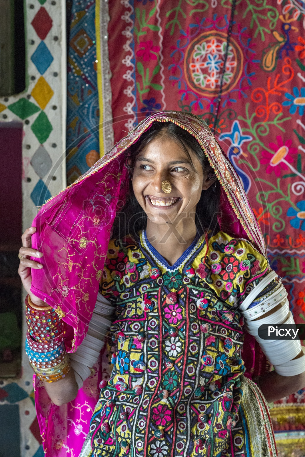 Smiling Girl in Traditional Dress at Bhirandiyara Village, Kutch