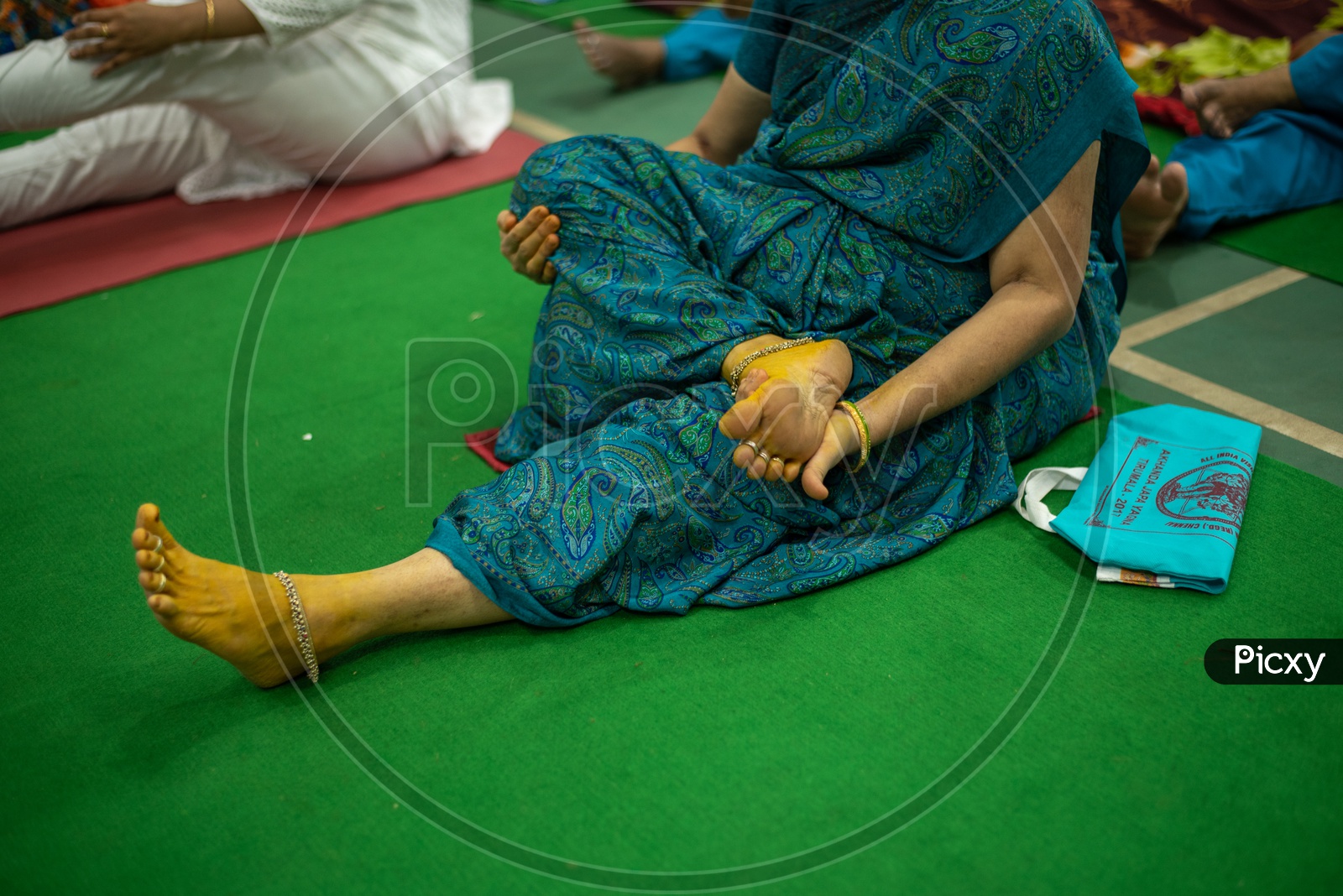 A senior/elder woman practising Yoga. International Yoga Day, 2018