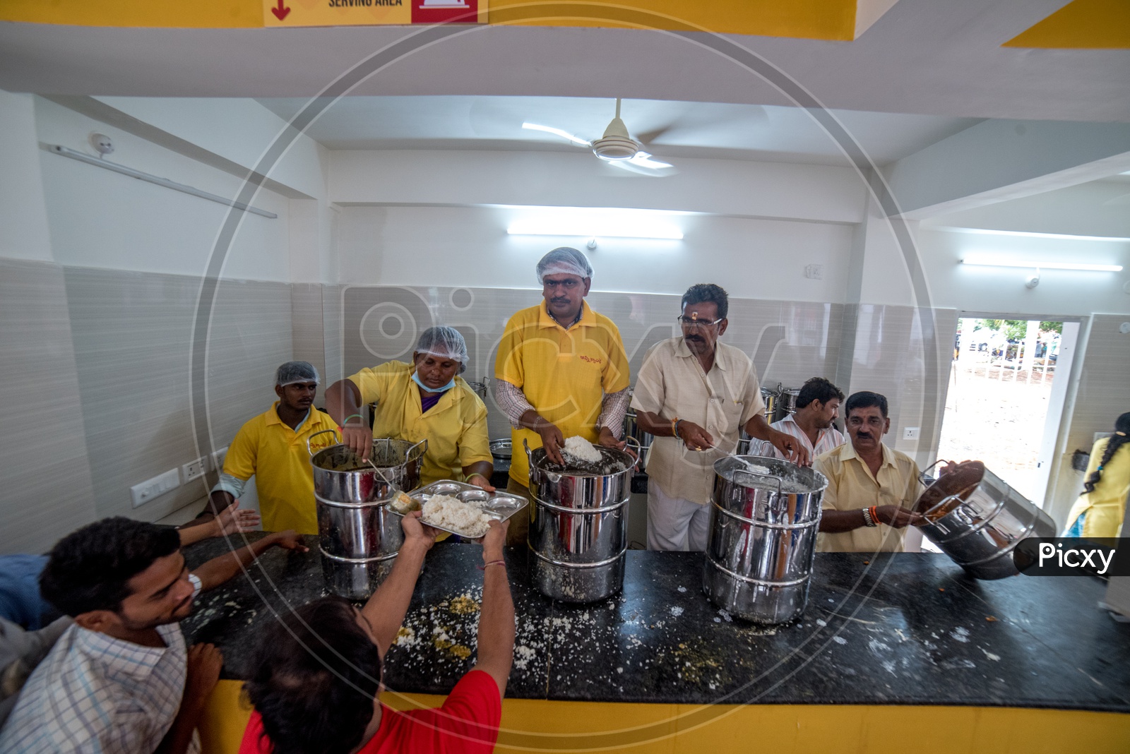 Serving food in anna canteen
