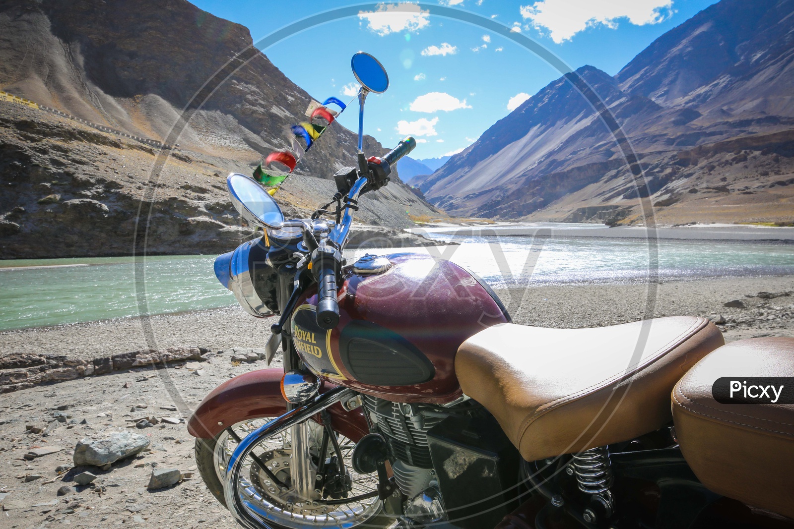 Royal enfield bullet amidst hills and mountains of Leh Ladakh