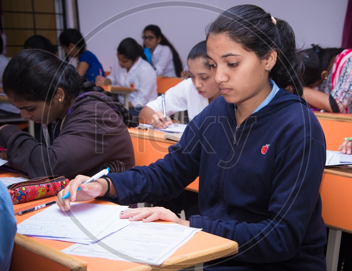Student writing an exam at an educational institution