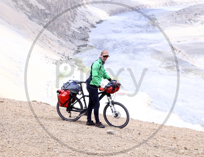 Foreign Tourist with Cycle