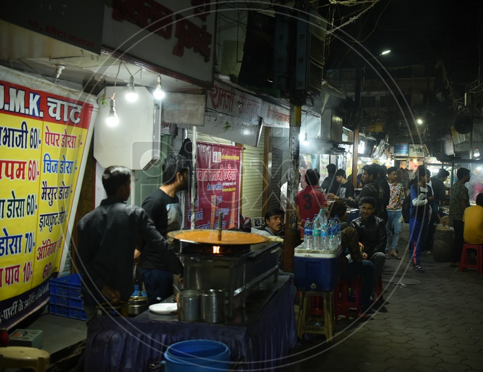 Sarafa Bazaar night street food stalls.