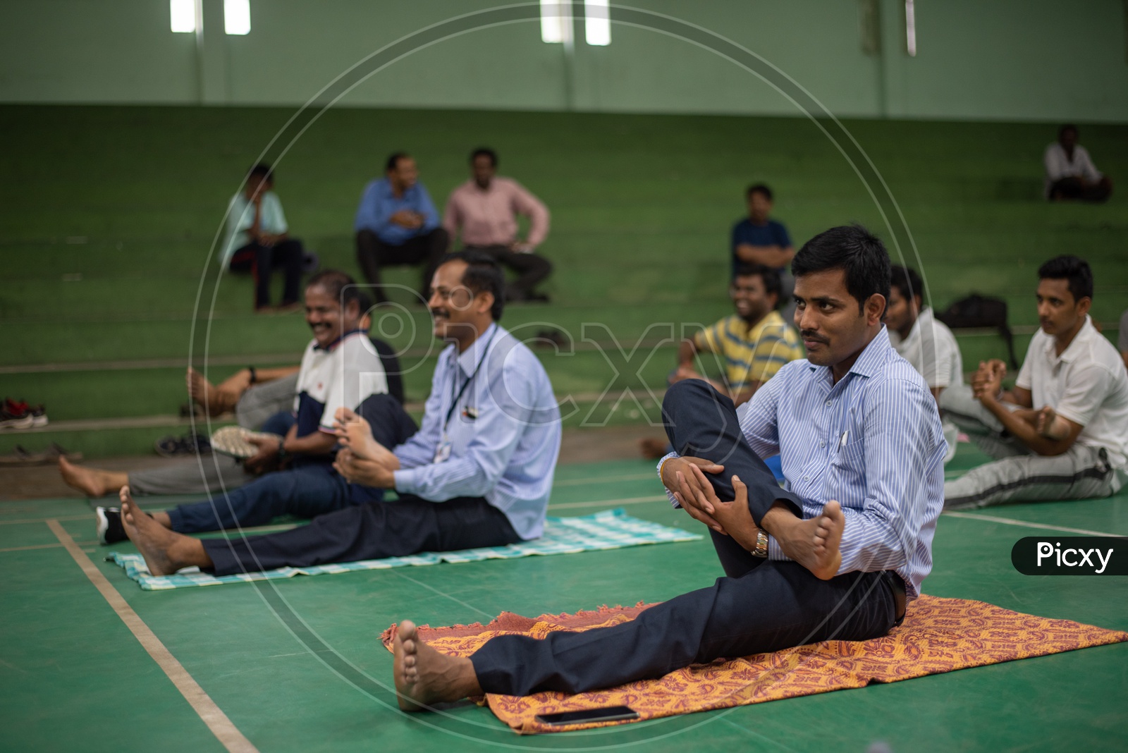 Employees performing/practicing Yoga, International Yoga Day, 2018