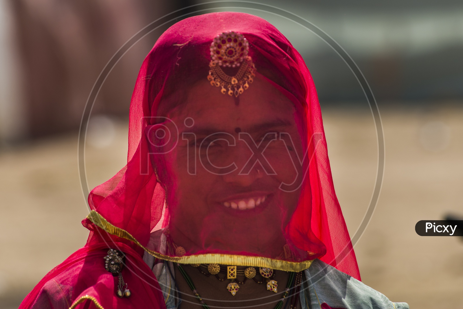Smiling Rajasthani Woman in Traditional Attire