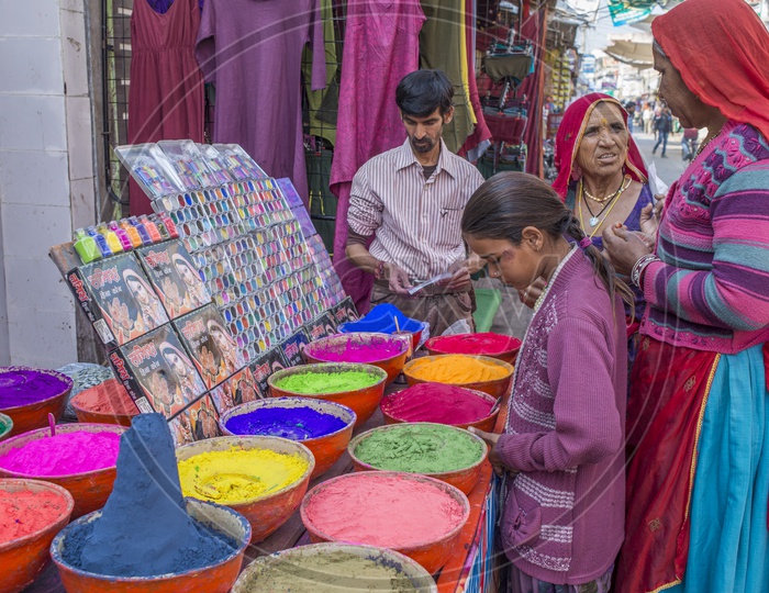 Rajasthani Women Buying Colors for Holi Festival, Pushkar
