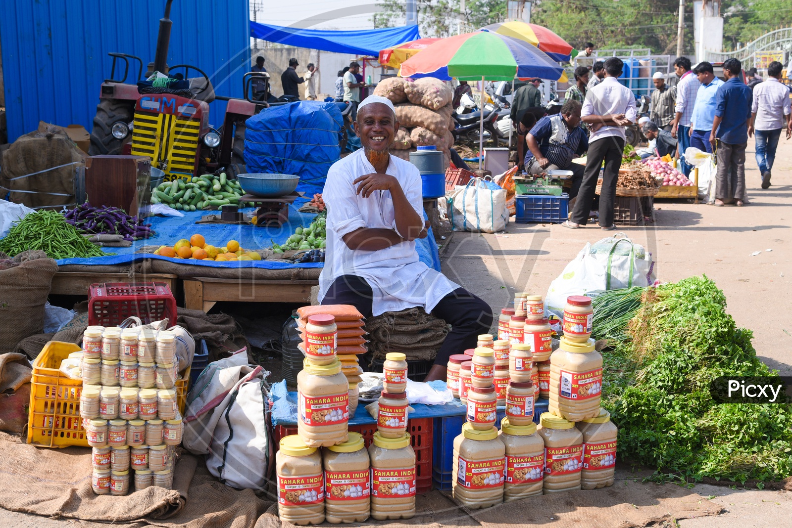 Vendor selling ginger and garlic paste