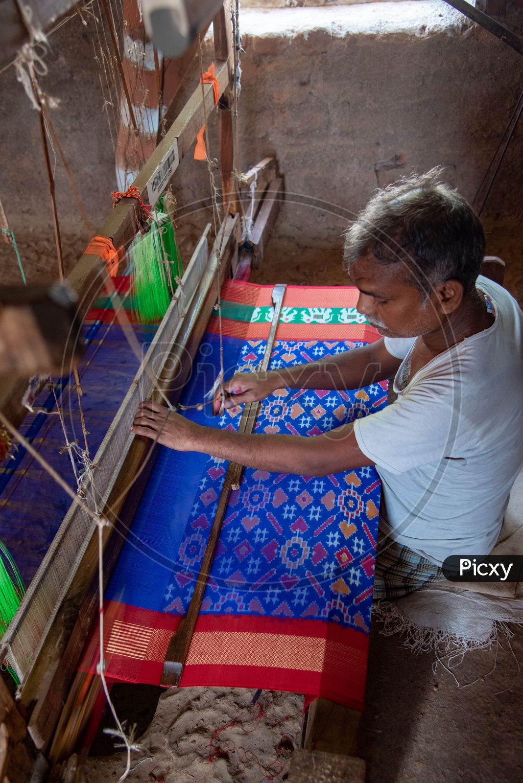 Weaver making Ikkat Handloom Saree  in Pochampally