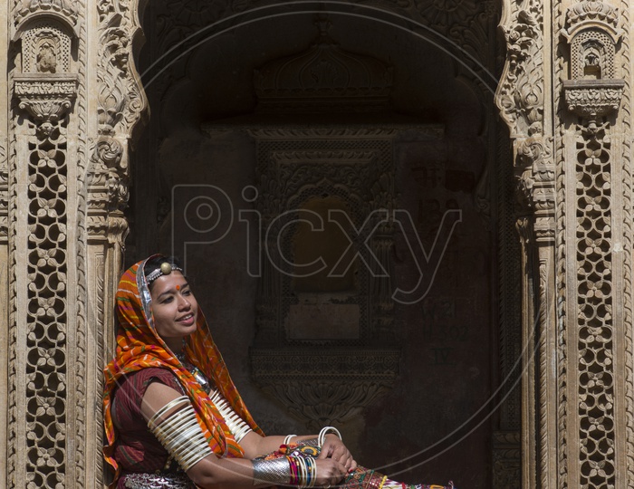 Rajasthani Woman in Traditional Attire at Patwa Haveli