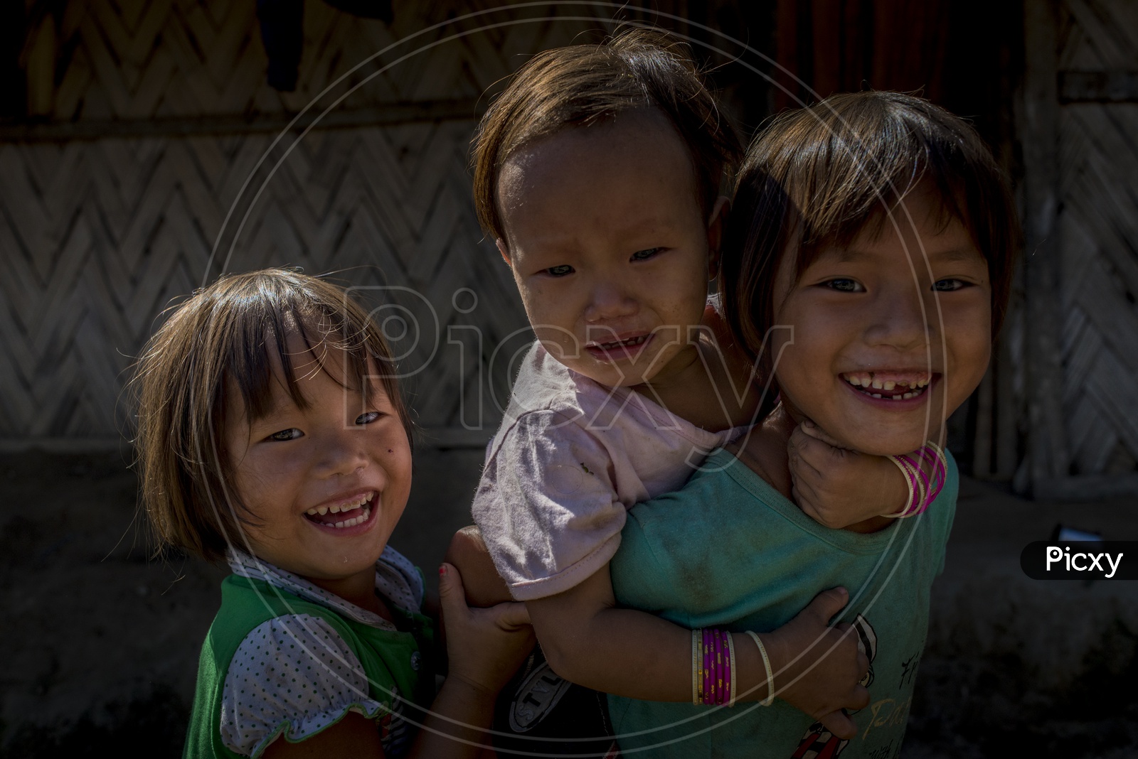 Smiling kids in Aalo Jamlo Mongku Adi, Minyong Tribe