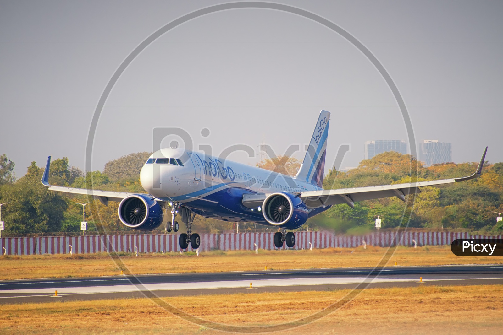 IndiGo Airlines Airbus A320neo landing at Ahmedabad International Airport