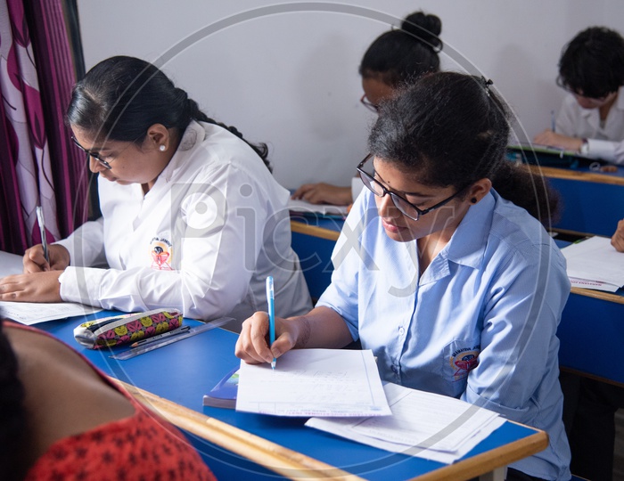 Students writing an exam at an educational institution