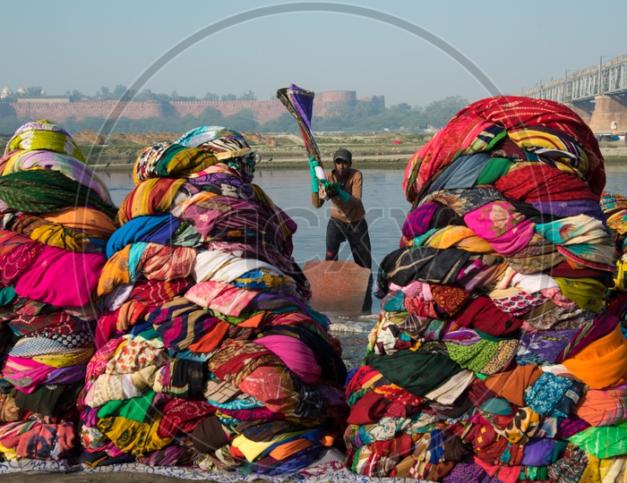 Washerman on banks of river Yamuna in Agra