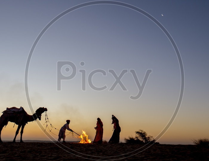 People around bonfire In Desert, Rajasthan