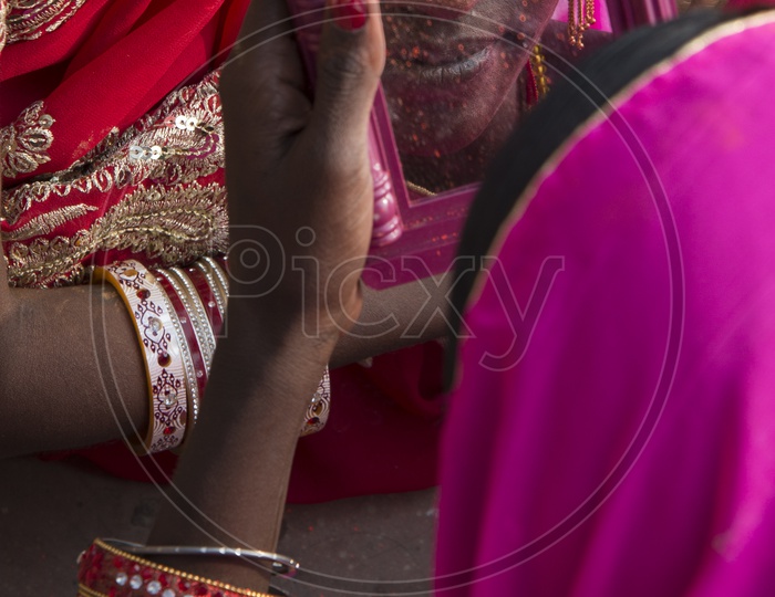 Women looking in Mirror, Varanasi