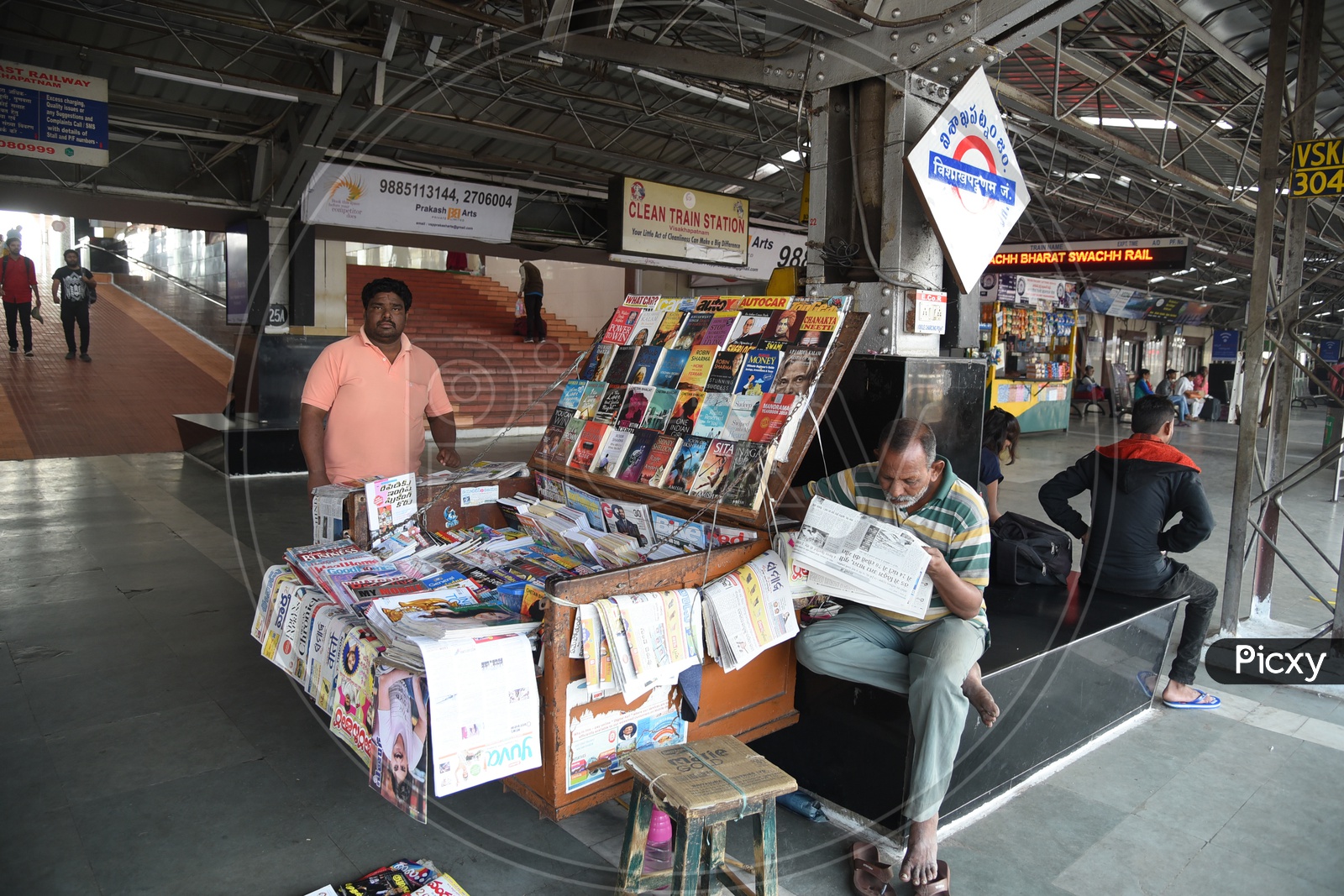 News Paper Vendor at Railway Platform