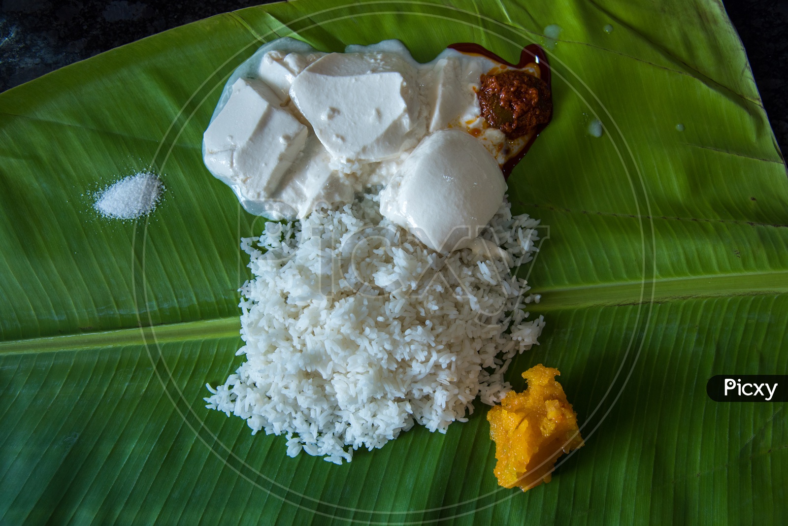 Salt, Curd, Mango Pickel and Sweet at Murugan Hotel