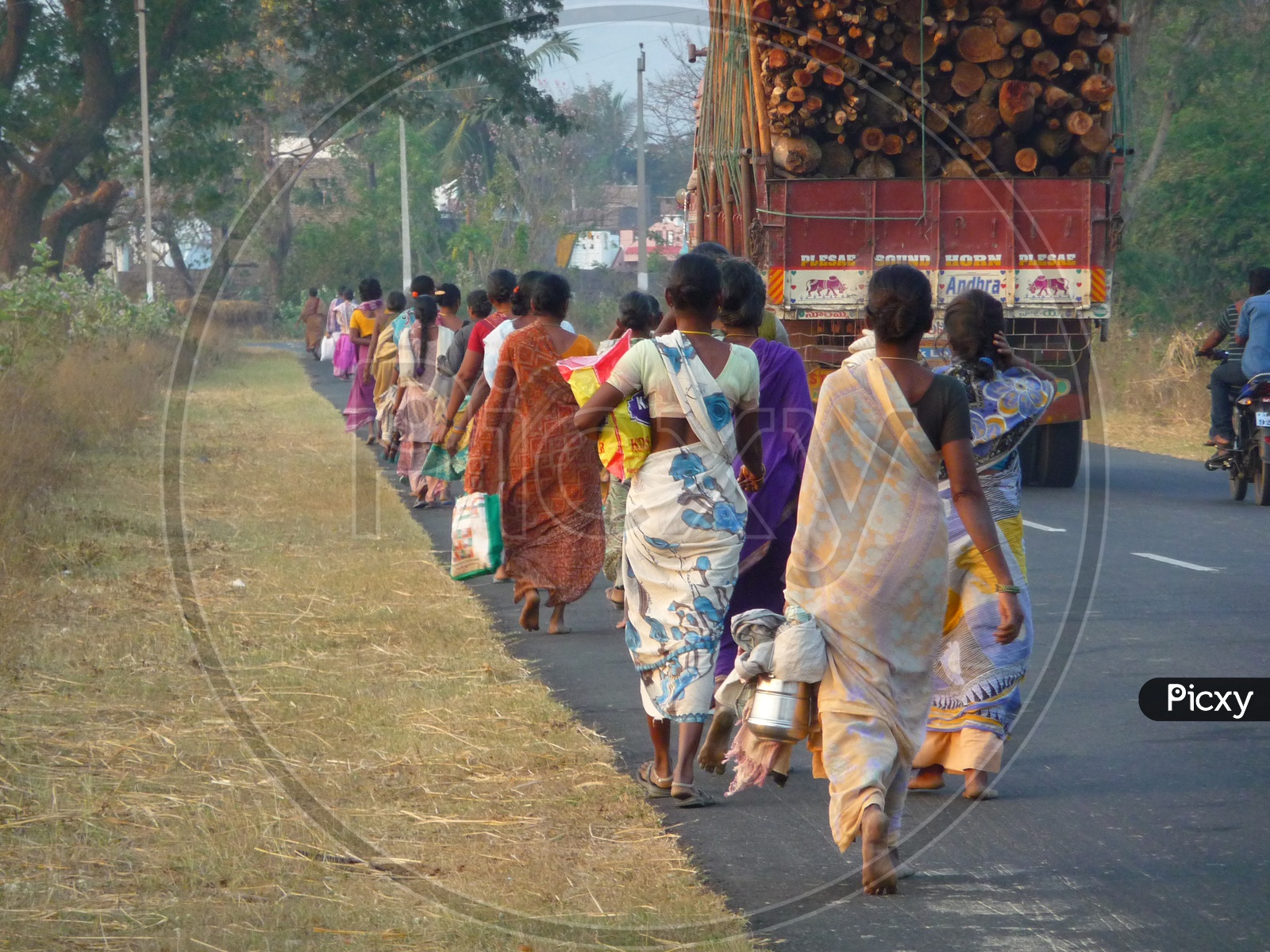 Women going to home after completion of work
