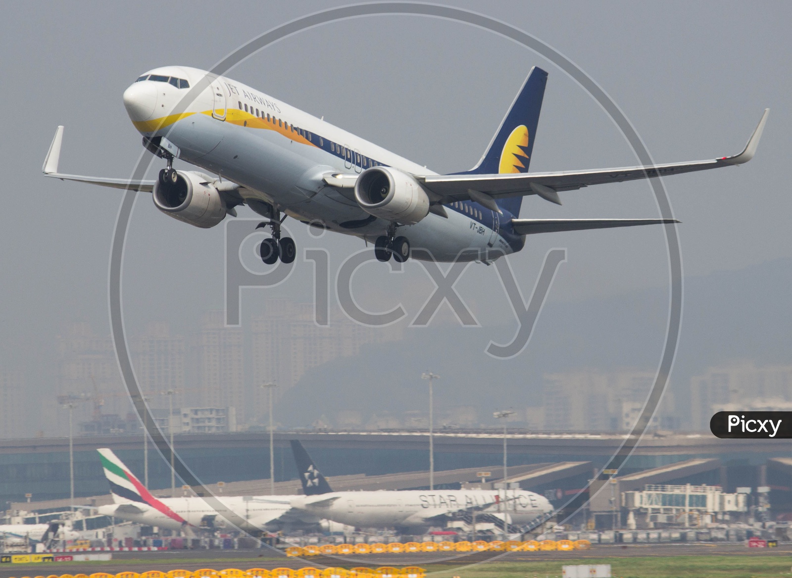 Jet airways B737 climbing from Mumbai airport.
