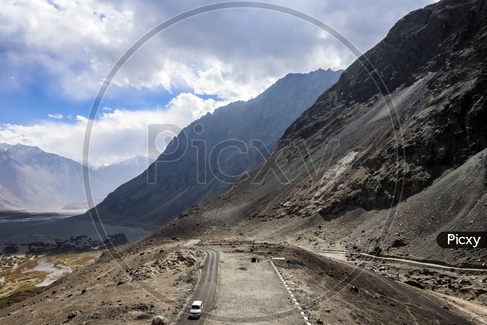 Roads in Leh ladakh region amidst Hills and Snowy Mountains.
