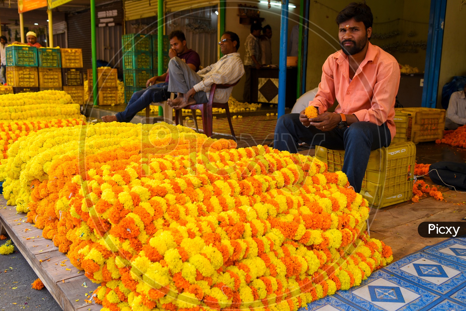 Flower vendor at flower market in Hyderabad