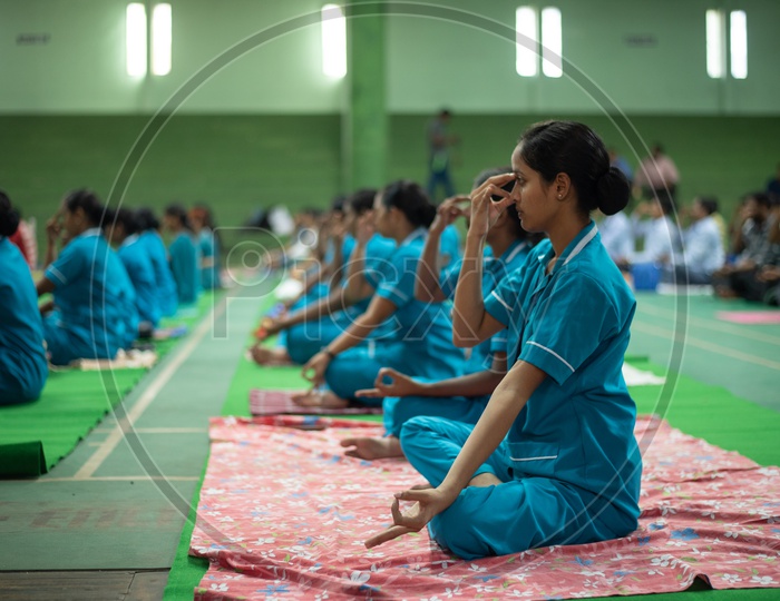 A nurse practising Yoga, International Yoga Day, 2018