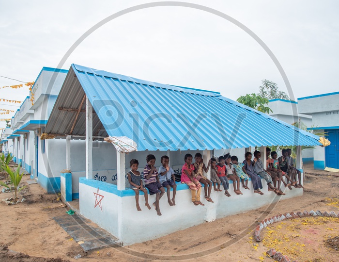 Kids at Community Centre of newly built government houses by VRO Village Reconstruction Organisation.