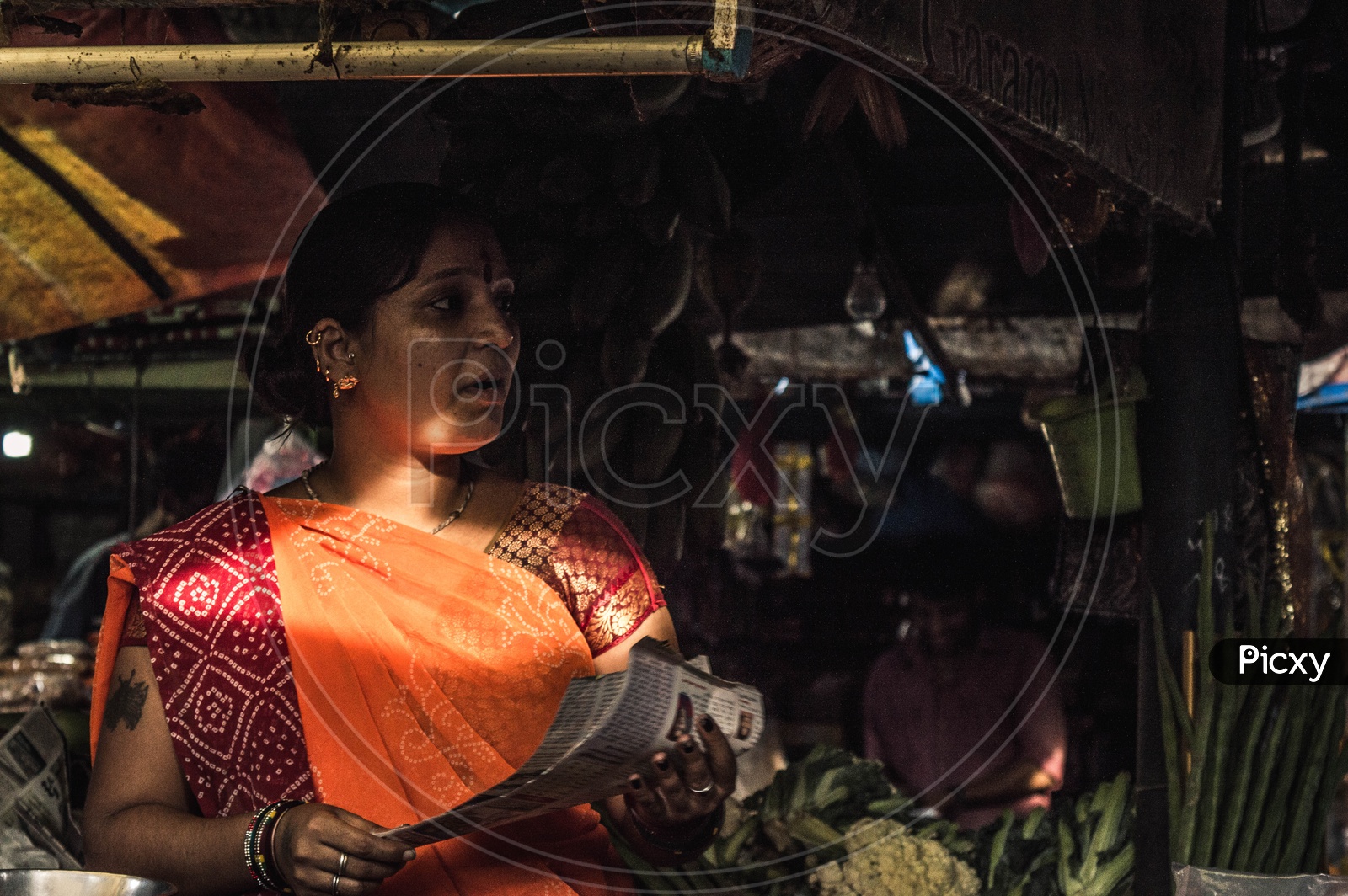 Woman at Vegetable Market
