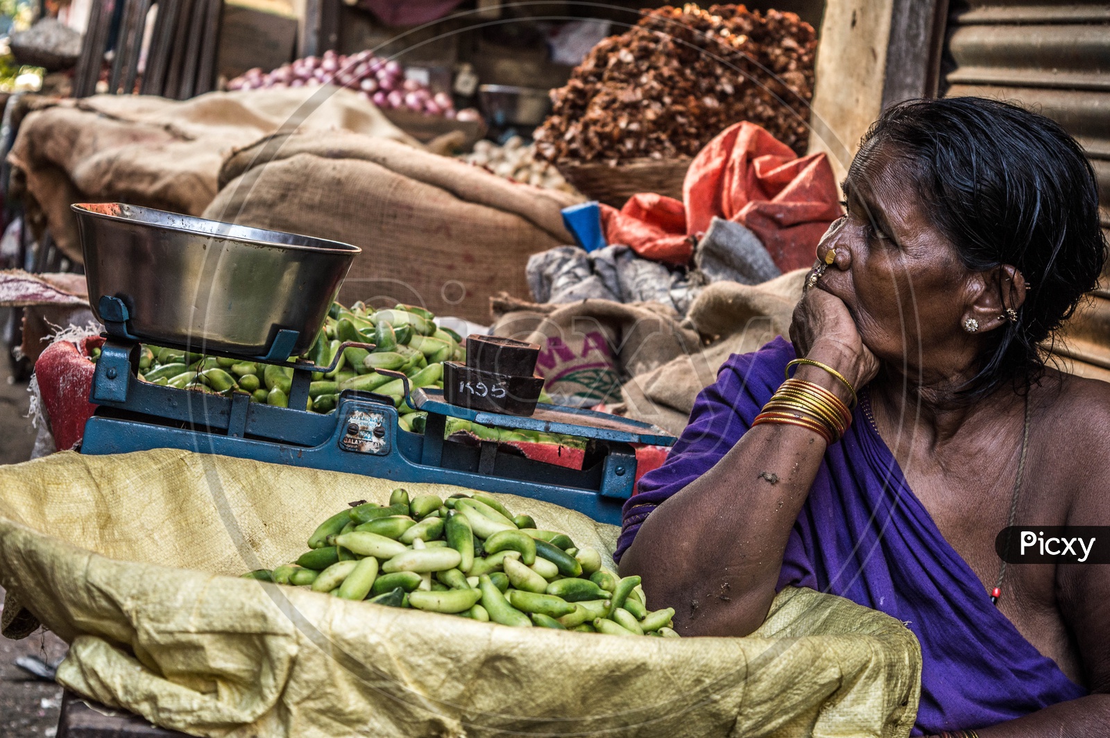 Female Vendor at Vegetable Market