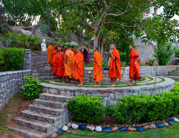 Monks offering prayers to Buddha