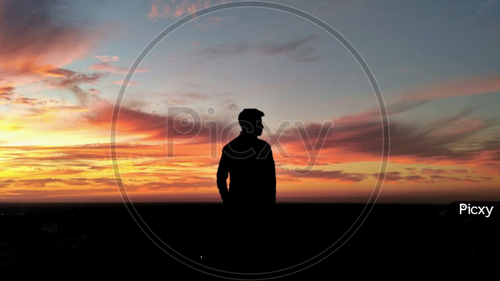Silhouette of Young Man Standing Alone, Depression