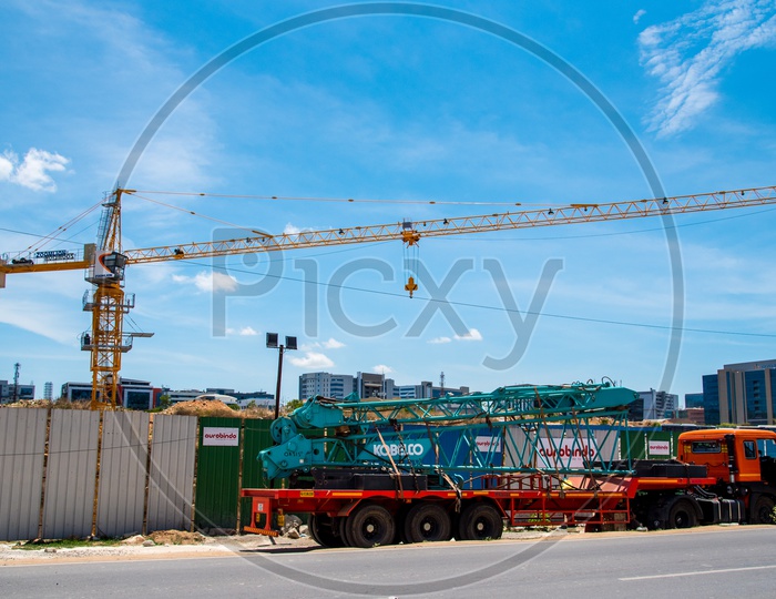 Construction Cranes at a building site in Gachibowli