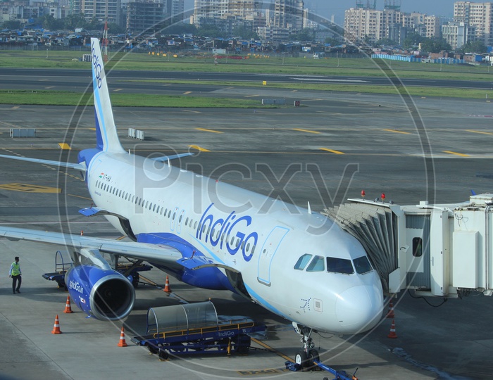IndiGo airlines A320 waiting for passengers to board at mumbai international airport.
