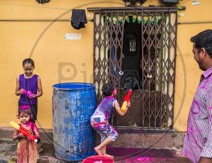 Kids Celebrating Holi Festival in Begum Bazaar