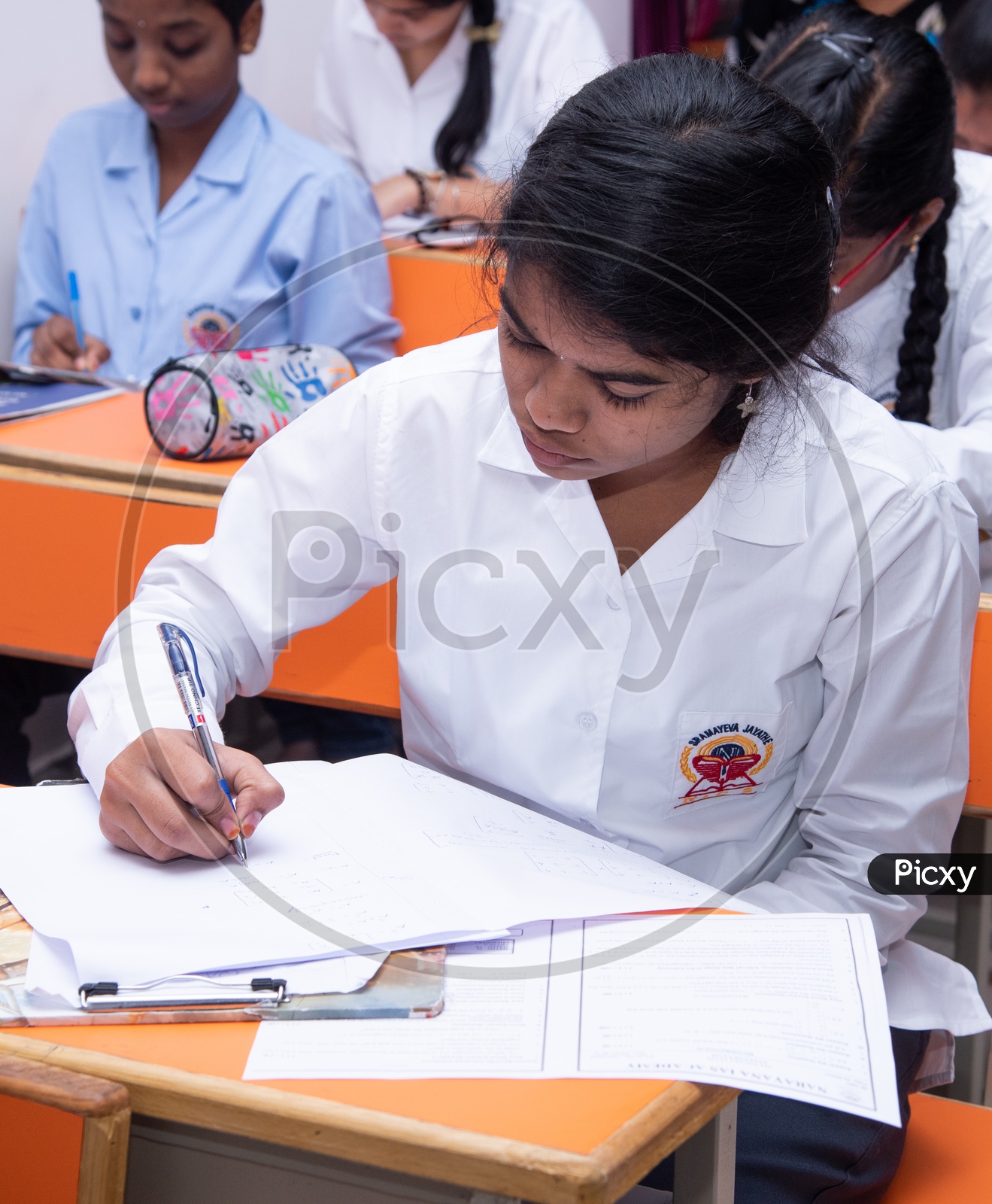 Student writing exam in an educational institute in Telangana