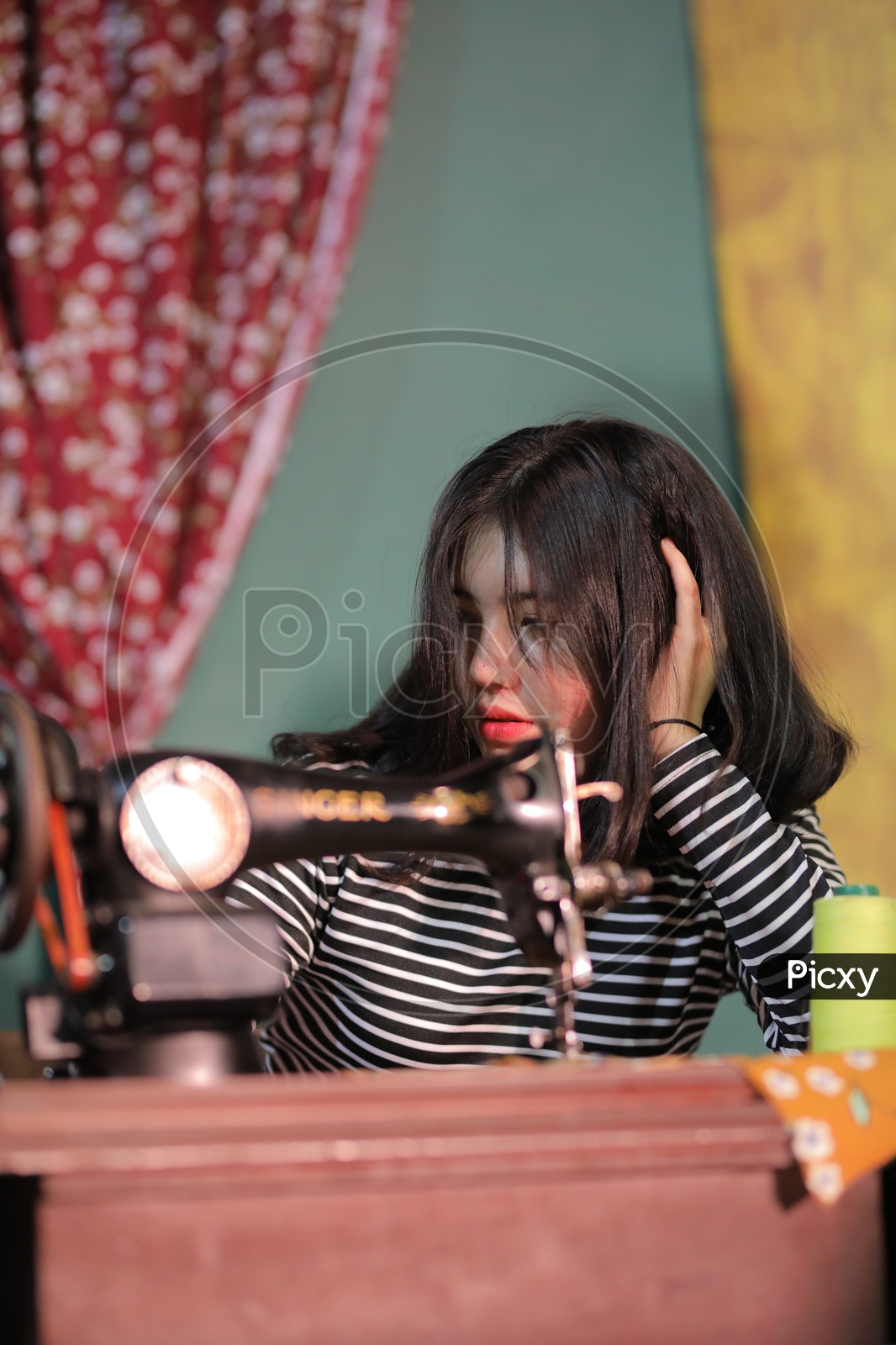 Vietnam Girl with Tailoring Machine