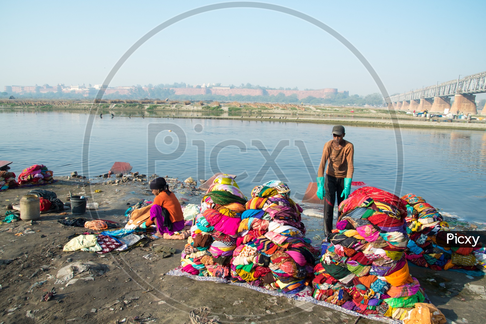 Washermen on banks of river Yamuna in Agra